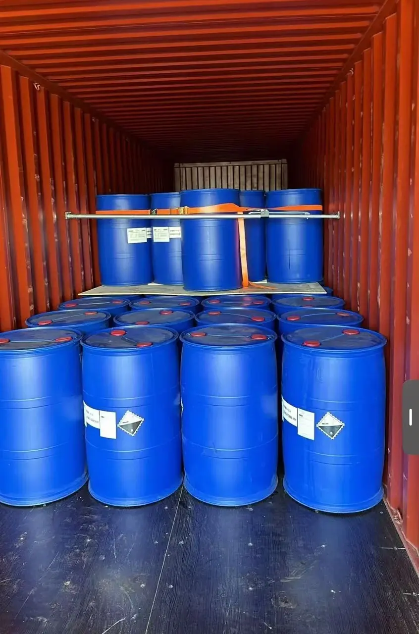 HDPE drums stacked inside a shipping container