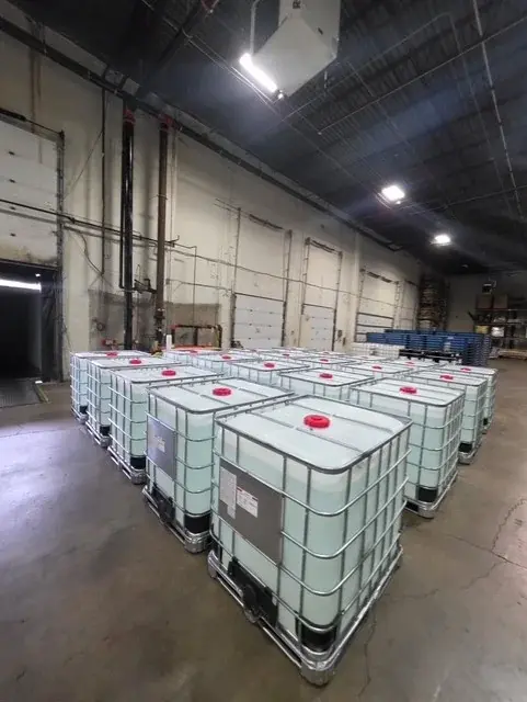 IBC totes staged in a warehouse